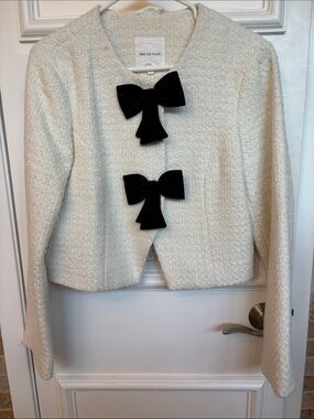Avec Les Filles Cream Bouclé Jacket with Black Bow Accents